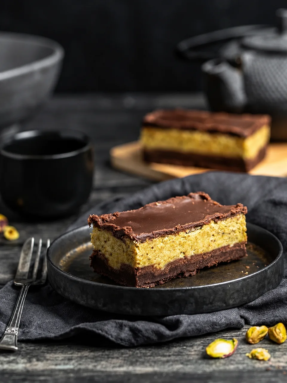 Chocolate layered slice with a coffee