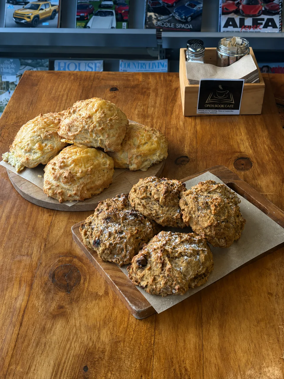 Plates of scones on the counter at Open Book Cafe